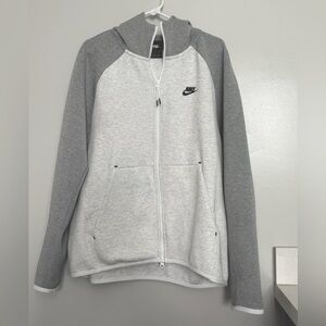 Nike men’s gray hooded zip up jacket. Size large.